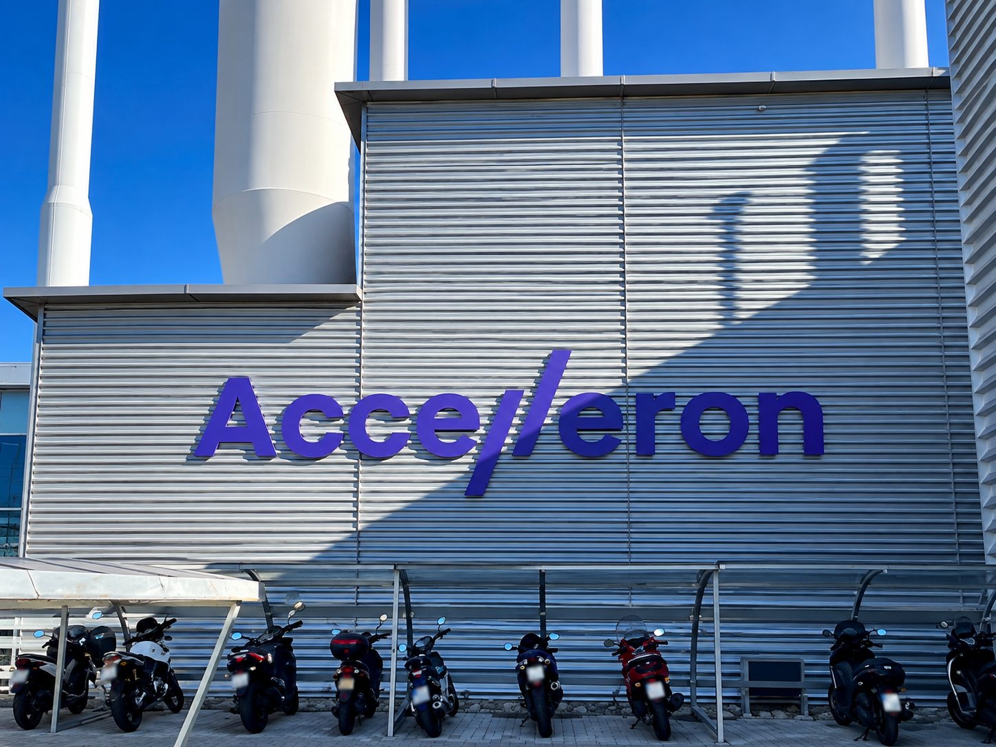 Accelleron's rebranded office reception area with illuminated logo signage