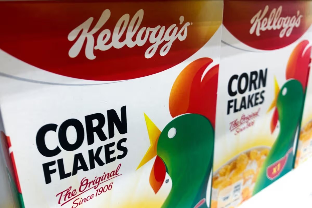 Close-up of Kellogg's Corn Flakes packaging on the shelf