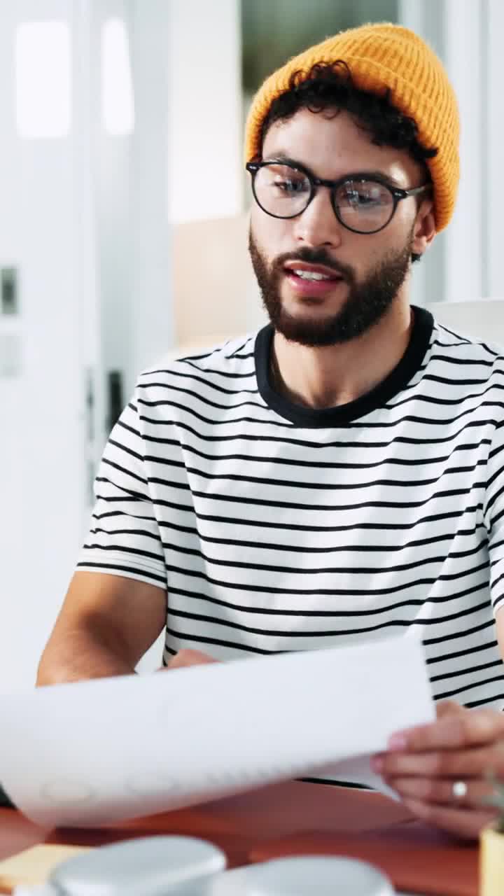 Reviewing documents at a desk
